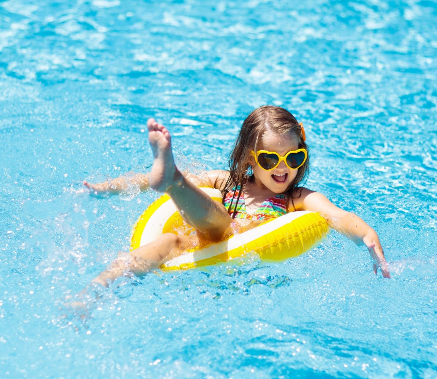 Happy Kid in swimming pool